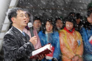 Shouwang church pastor Jin preaching