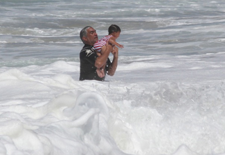 Pat Watson emerges with baby
