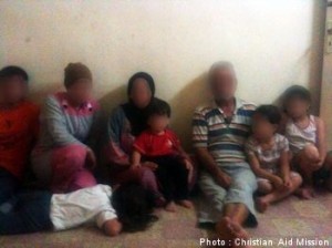 Syrian Christian family who escaped to Lebanon