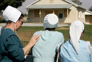Amish women mourn at site of school shooting