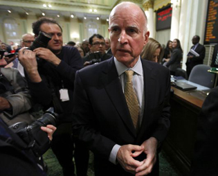 Gov. Brown leaves the Assembly following is address