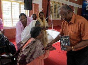 sick-woman-receiving-bible-from-paul-ciniraj1