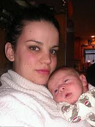 Amanda and her baby, before the slide