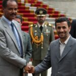 Iranian President Mahmoud Ahmadinejad (R) shakes hands with Eritrean President Issaias Afeworki in Tehran in May 2008