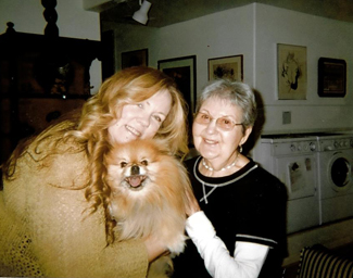 Little Bear held by Sharon Lee (left) and Nikkie's mom, Jesse Blumenfeld