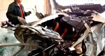 Remains of Honda Civic after collision with big rig