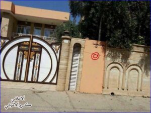 The Arabic letter "n" (inside red circle), signifying "Nasarah" (Christian), on a Christian home in Mosul (photo AINA) 