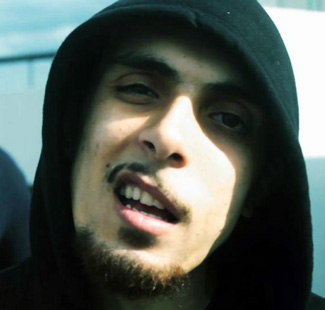 The rapper in a hoody before his trip to Syria