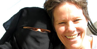 Dunham embraces Muslim woman