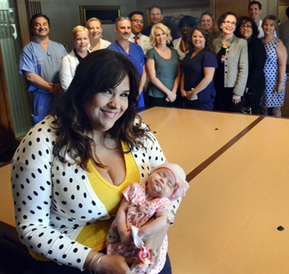 Ruby with hospital staff (Sun Sentinel)