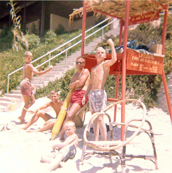 Dale Ghere (in red trunks) lifeguarding at St. Ann's Beach