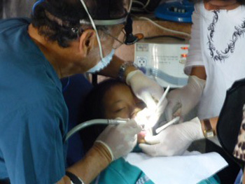Dr. Yamamoto treats a young patient