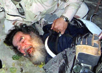 Hussein pulled from hiding place