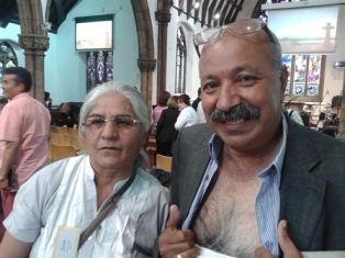 Ali shows place on his chest where Jesus left a mark