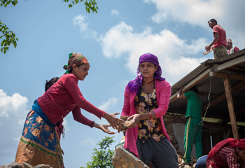 Women at work in rebuilding