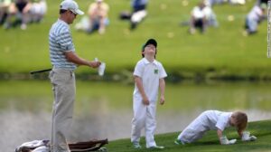 sons caddied for him at Agusta pre tournament par 3 event Will and Wyatt