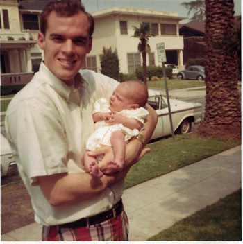 John holding his daughter Lisa, 1969