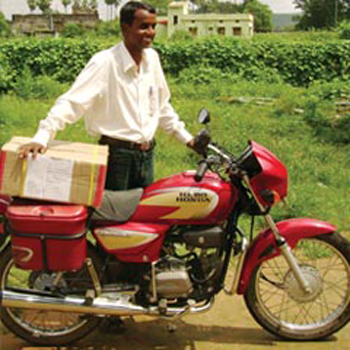 Unnamed worker carrying tracts