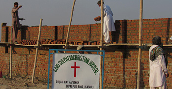 Building the wall around the new hospital