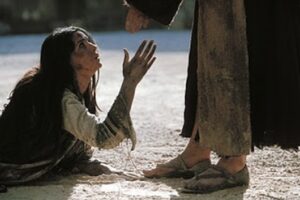 Woman caught in adultery at the feet of Jesus