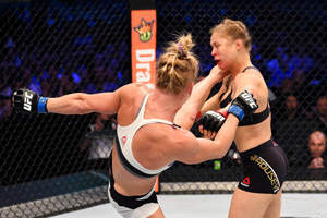 Holm and Rousey in the ring