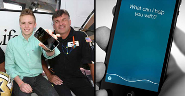 Sam Ray with rescuer, holding his iphone