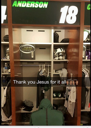 Anderson kneels in prayer in front of his new locker with the New York Jets, offering gratitude to God
