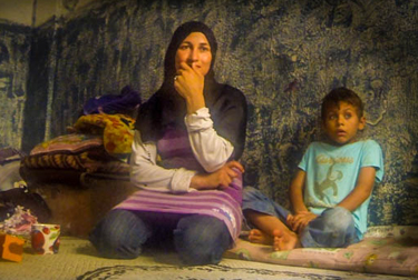 Displaced Syrian mother and child