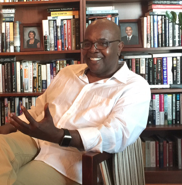 Cedric Johnson, in his personal library at home. Photo: Chad Dou