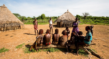 Berki speaking to villagers