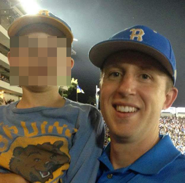 Klug with his son at UCLA game