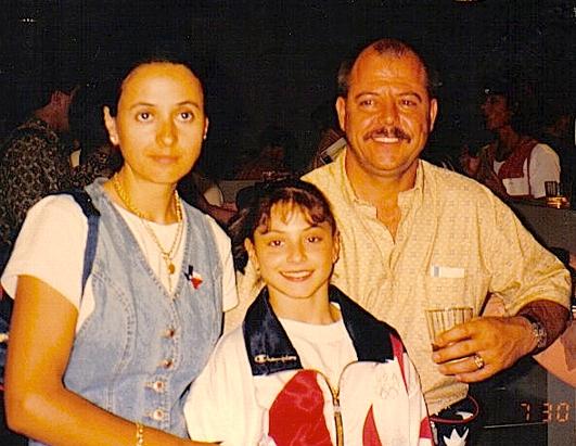 Little Dominique with her dad and mom.