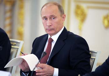 Vladimir Putin signing anti-missionary law