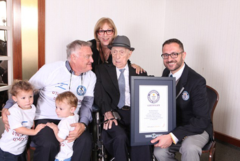 Marco Frigatti, Head of Records for Guinness World Records, presents Israel Kristal his certificate of achievement for Oldest living man on 11th March 2016, Haifa, Israel.  Picture credit: Dvir Rosen/Guinness World Records From L-R: grandchildren Nevo and Omer, Heim Kristal (son), Shula Kuperstoch (daughter), Israel Kristal, Marco Frigatti
