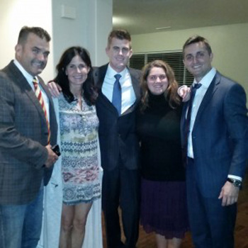 Billy in the center with his parents (left) and Jesus 4 Romania leaders, Darius and his wife (right)