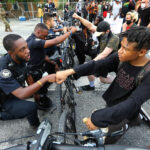 police in solidarity with black lives matter protesters