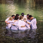 Nathaniel Buzolic baptizing in Jordan River